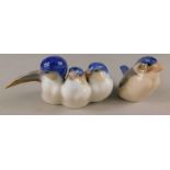 A Royal Copenhagen porcelain figure group, of three birds, and another similar (2)