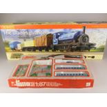 A Hornby Blue Highlander OO-gauge train set, and Lima HO-gauge electric train set, both boxed.