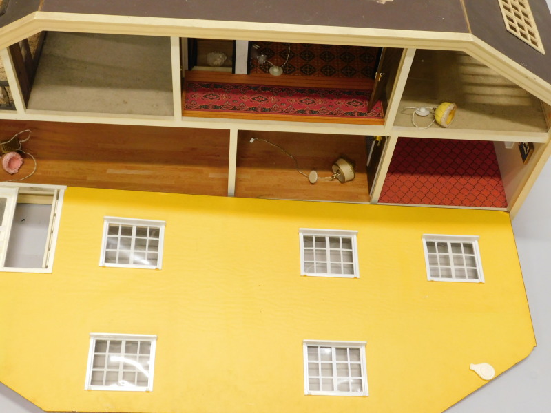 A 1980's/90's retro style plastic and painted card dolls house - Image 2 of 2