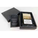 A Benson and Hedges limited edition gold plated cigarette case, modelled in the form of a