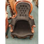 A Victorian mahogany show-frame open armchair, with a padded back, arm rests and seat, on cabriole