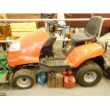 A ride on petrol mower, with Briggs and Stratton engine and some accessories, number AJ 102 18H