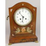 A late 19thC French mahogany mantel clock, the case inlaid in silver coloured metal, copper and