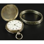 Two items of silver jewellery, to include a silver hinged bangle and a hunter pocket watch, with