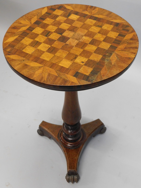 A William IV mahogany games table, with an inlaid chess board in bird's eye maple and rosewood, on a