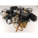 Miscellaneous cameras, to include an Exakta with lens, Canon etc.