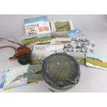 A collection of items, to include an aviation style compass, various first day covers postcard and a
