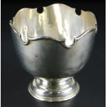 A George V silver sugar bowl, with a lobed rim and tapering foot, London 1931, 4½oz
