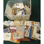 A large quantity of first day covers, stamps etc.