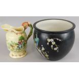 Two items of pottery, a Crown Devon Daisy Bell musical mug, and a Phoenix ware jardiniere.
