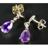 A pair of 9ct white gold amethyst drop earrings, each set with tiny white stone, 1.8g all in.