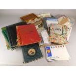 A quantity of stamp albums, loose stamps, first day covers etc. (three trays)