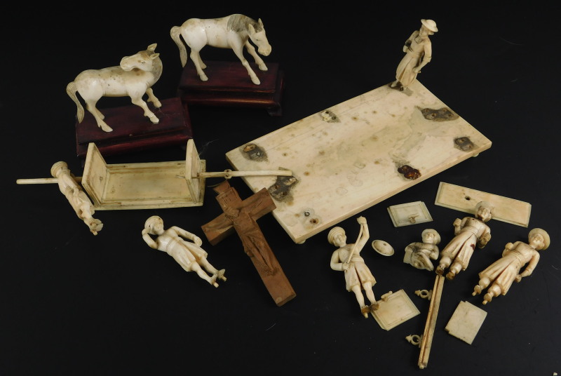 A collection of Indian and oriental ivory, to include a pair of horse figures and a procession group