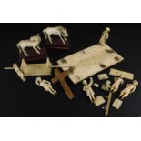 A collection of Indian and oriental ivory, to include a pair of horse figures and a procession group