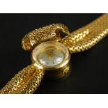 An 18ct gold Eterna-matic ladies' wristwatch, in articulated abstract bow form, with hinged cover,