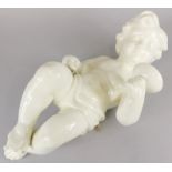 A Spanish ceramic wall mounting putto, holding a glass or goblet, 44cm high