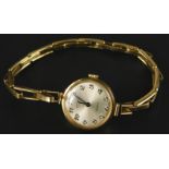 A 9ct gold Rotary ladies' wristwatch, with circular watch head, a silvered dial, with expanding