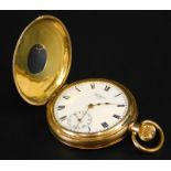 An American Waltham Traveller gold plated half Hunter pocket watch, the case guaranteed not to
