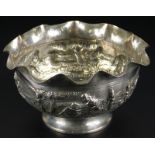 An Eastern white metal sugar bowl, with chased decoration of figures etc., possibly Burmese, 2oz