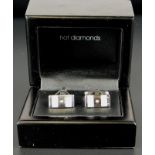 A pair of silver Hot Diamonds cufflinks, set with two mother of pearl bars, and with a central