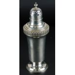 A George V silver sugar caster, decorated with a band of stylised leaves, turned finial and engraved