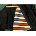 Two vintage ladies black satin and lace capes, one with beadwork decoration and striped wool lining.