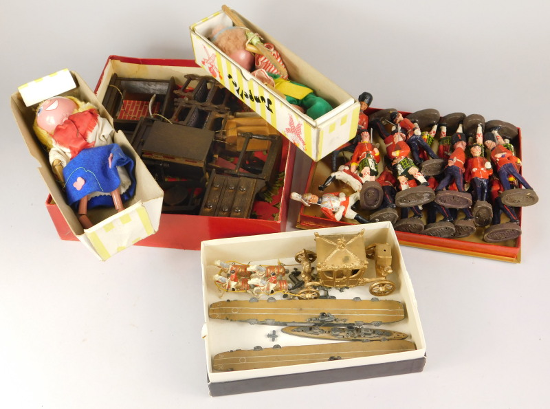 A collection of toys, to include two Pelham puppets, a Coronation coach, two heavy die-cast aircraft