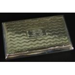 A William IV silver rectangular snuff box, with engine turned decoration of waves and gilt interior,