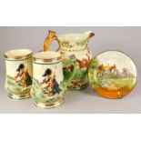 A collection of pottery, to include two Sylvan Scottish themed relief moulded jugs, a Crown Devon