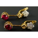 A pair of 18ct gold drop earrings, each set with tiny diamonds and rubies, design of diamond