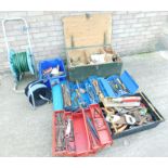 A large quantity of woodworking tools, saws, a hose reel, tool chest etc.