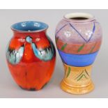 Two Poole pottery vases, to include an example with a geometric design of multicoloured bands,