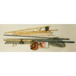 A collection of fishing equipment, to include a mahogany reel, a Monarch fixed reel, fishing rods