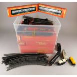 A large quantity of Hornby model railway track, rolling stock etc.