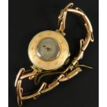 A 15ct gold Hamilton & Co of Calcutta ladies enamel wristwatch, the circular watch head, with a