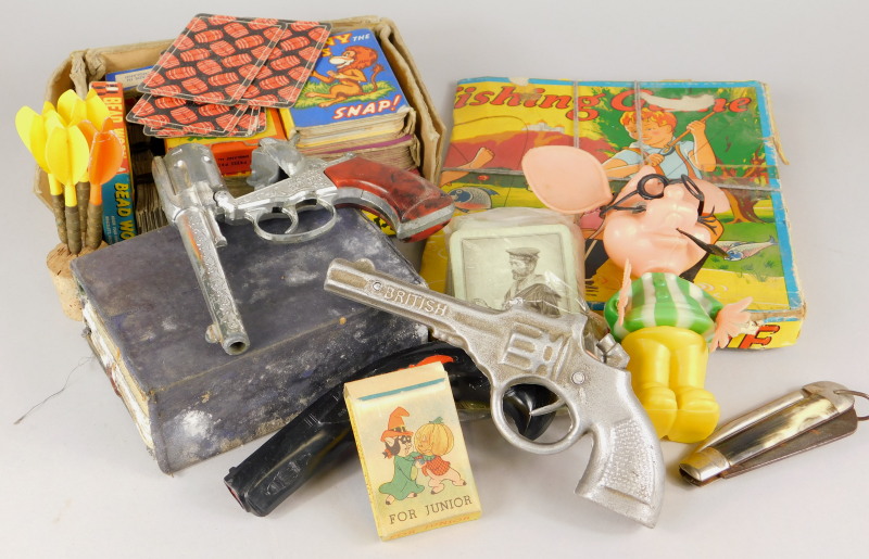 A collection of children's toys, to include a Rustler Top Gun child's pistol, a Code G gun,