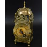 After Thomas Mudge. A brass lantern clock, the movement with escapement etc., 26cm high