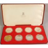 A set of seven 1977 silver Jubilee medallions, various Mints from the Commonwealth and a 22ct gold