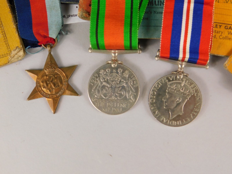A collection of WWII medals and ephemera relating to a Private R W Flack, of The Bedfordshire and - Bild 2 aus 5