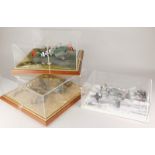 Three cased aviation related models, to include a German WWII plane, etc.