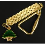 An 18ct gold keychain, with enamel decorated fir tree drop, 13.9g all in.