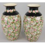 A pair of Crown Ducal Staffordshire chintz printed vases, with black borders to the top, 31cm high.