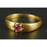 A ruby gypsy ring, in central star design, yellow metal, unmarked, dated 1274, 2.5g all in.