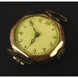 A 9ct gold watch head, with white enamel dial, (AF), blue hands, with octagonal watch head, 13.6g