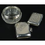 A collection of small silver, to include two vesta cases, each with engraved decoration and a cut