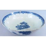 A late 18th/early 19thC English porcelain bowl, decorated in blue with oriental scenes, river