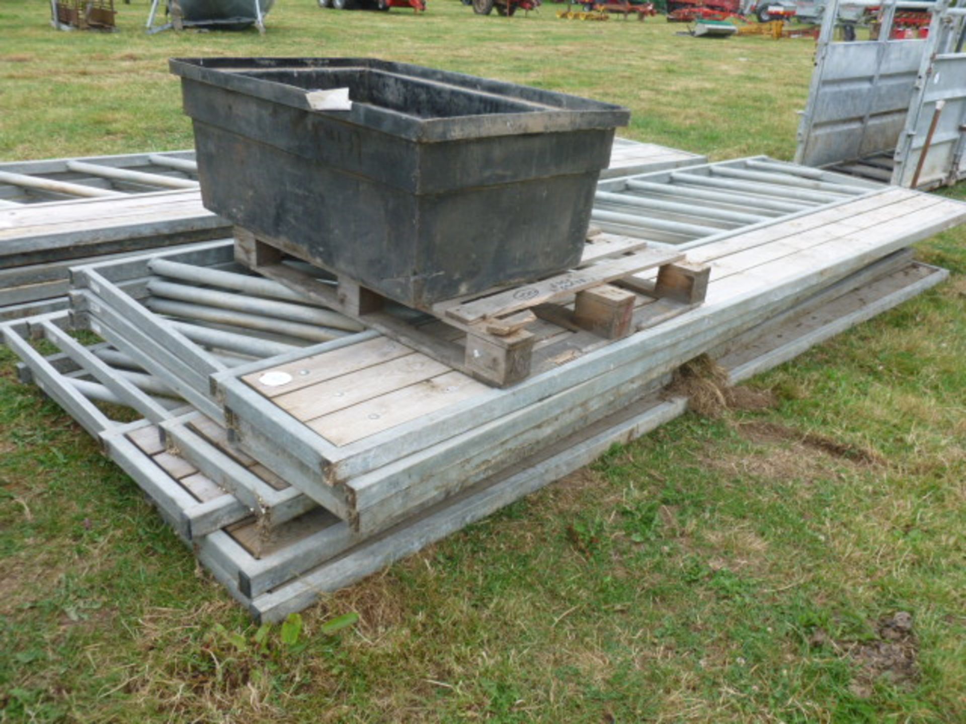 7 CATTLE FEED BARRIERS APPROX 14FT