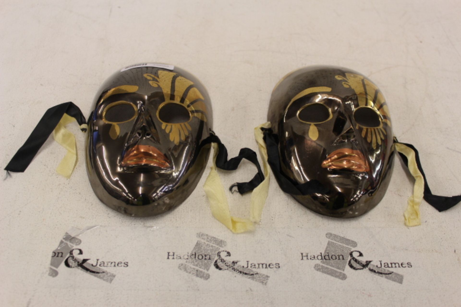 Grade U Two Ornate Decorated Metal Masks