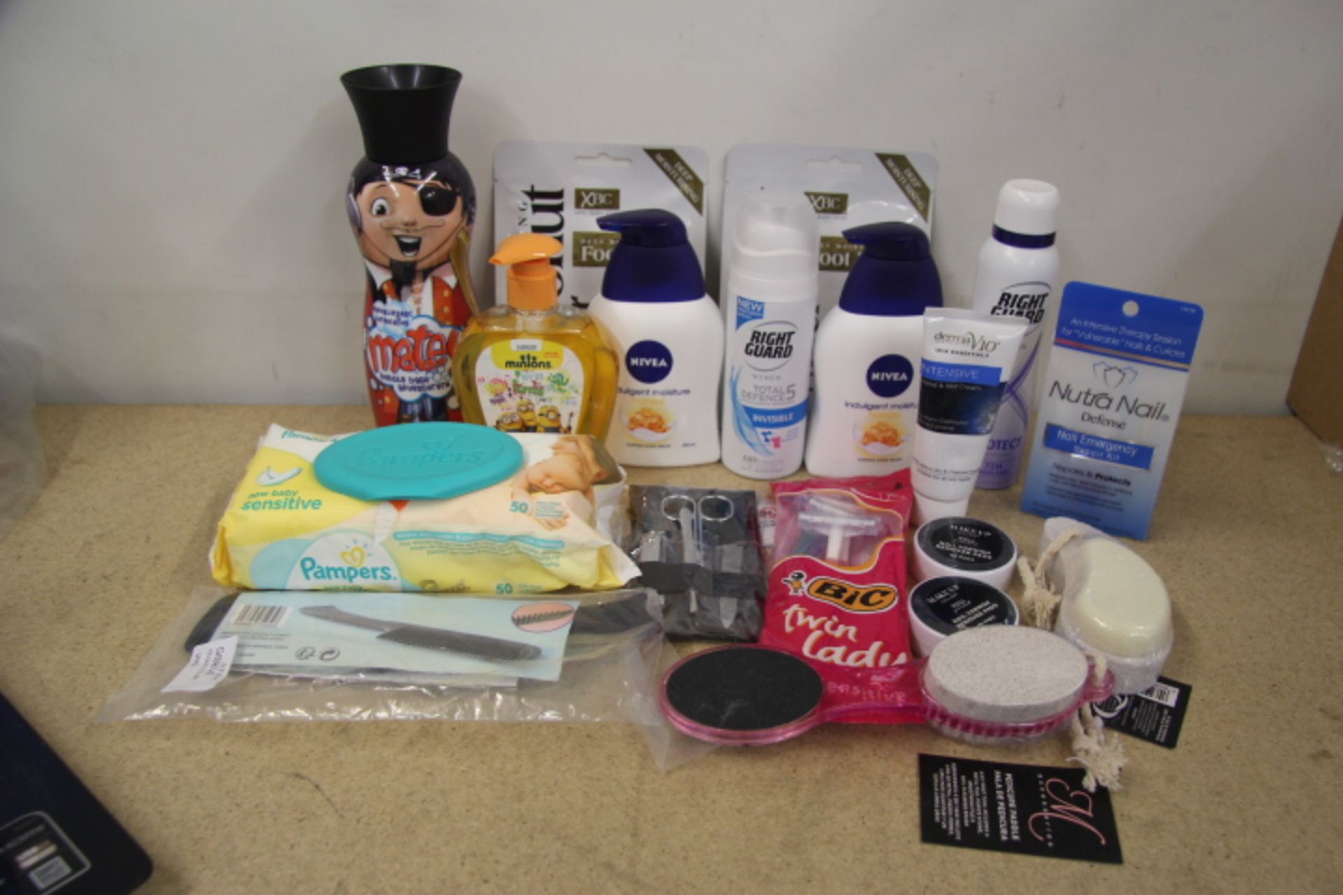 Grade U Bag of Various Toiletries Including Nivea, Bic, etc.