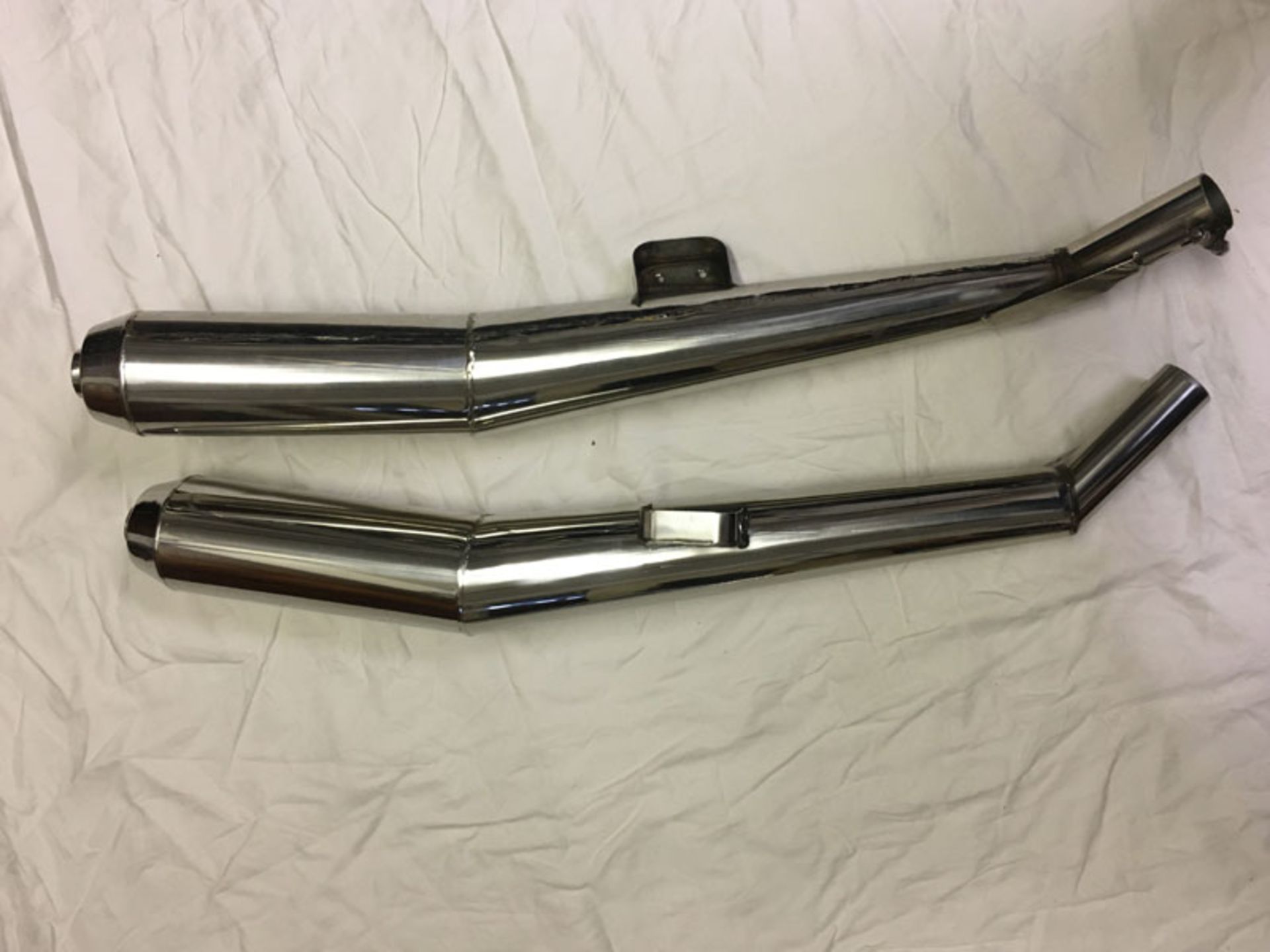 A Pair of Motorcycle Silencers
